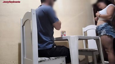 A youthful pair engages in intercourse openly at a tavern