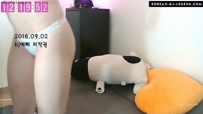Pretty Korean cam-girl performs a body show while giving a blow job
