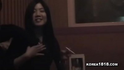 Korean karaoke hostess gets horny and sings a sexy song