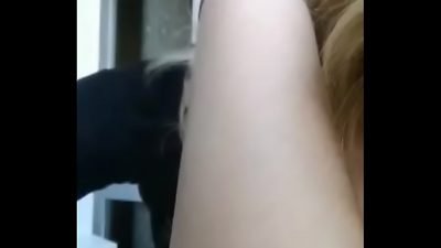 A pretty Russian woman wears tight leggings to show off her beautiful big boobs.