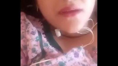 A sexually aroused Indian girl engages in explicit conversation on the phone with intense passion