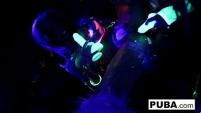 Abigal Mac and Ava Addams in a steamy black light scene on a rainy night