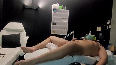 A compilation of pegging scenes with a female dominant masseuse and her submissive partner.