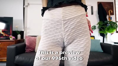 A tattooed woman with a noticeable cameltoe in her new white leggings!