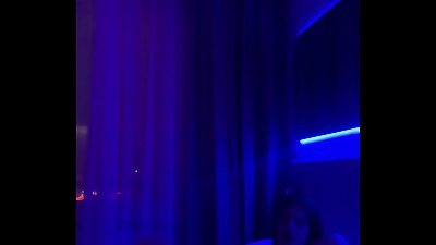 The redheaded woman uses her hand to stimulate her intimate areas, her moist pussy is incredibly arousing