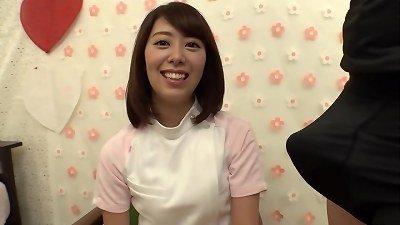 A nurse in white glaze engages in sexual activity with a large penis, satisfying her desire for physical stimulation in front of a hardened erection that cannot be a patient's